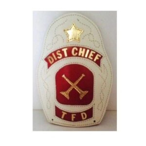 A white and red badge with gold star on it.