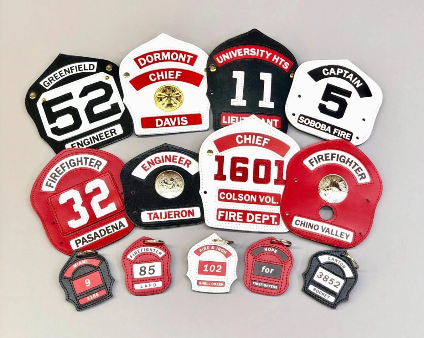 A group of fire department badges on display.